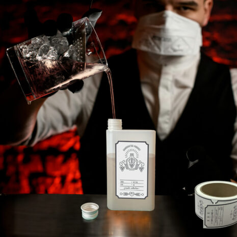 Young,Barman,In,Mask,With,Black,Gloves,Pours,Drink,From BB-007-STR GET Enterprises