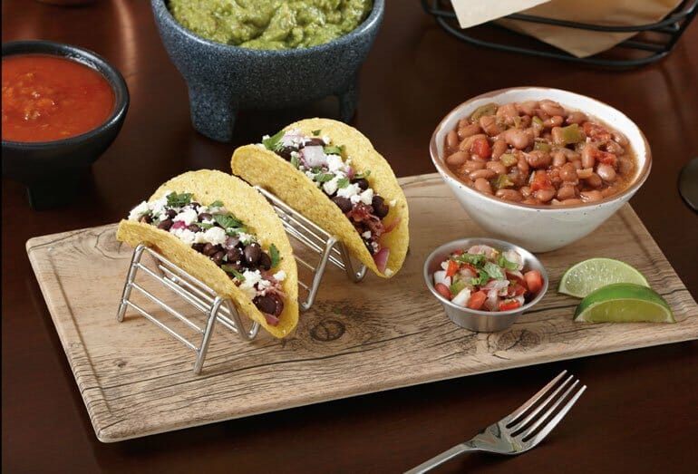 https://www.getserveware.com/wp-content/uploads/2022/09/taco-holder-with-faux-wood-granville-melamine-board.jpg